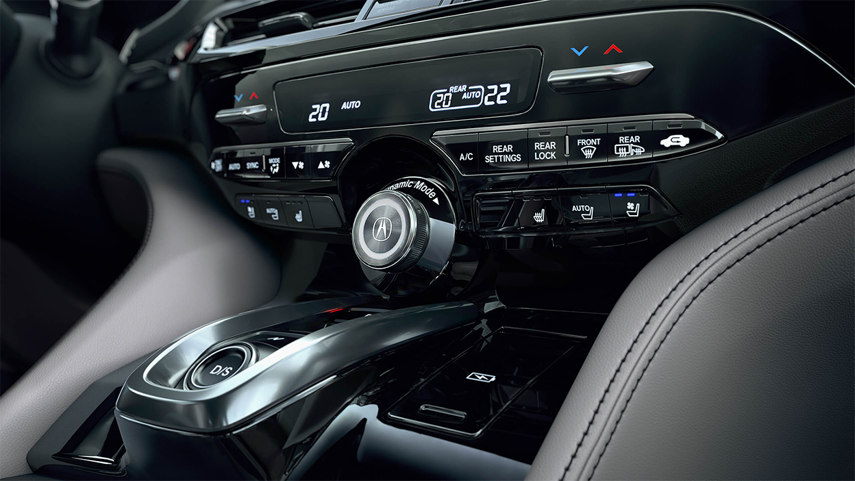 The control panel between the two front seats of an MDX.