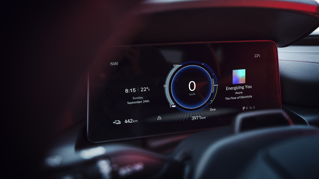 Macro closeup of digital instrument cluster screen.